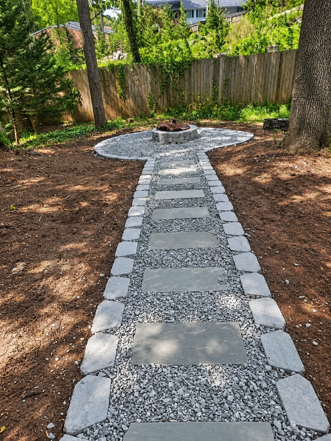 A stepping-stone garden path from Lovely Landscapes’ project portfolio